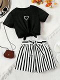 Printed girls' summer set, short sleeved T-shirt paired with casual shorts, stylish design, suitable for outdoor activities.
