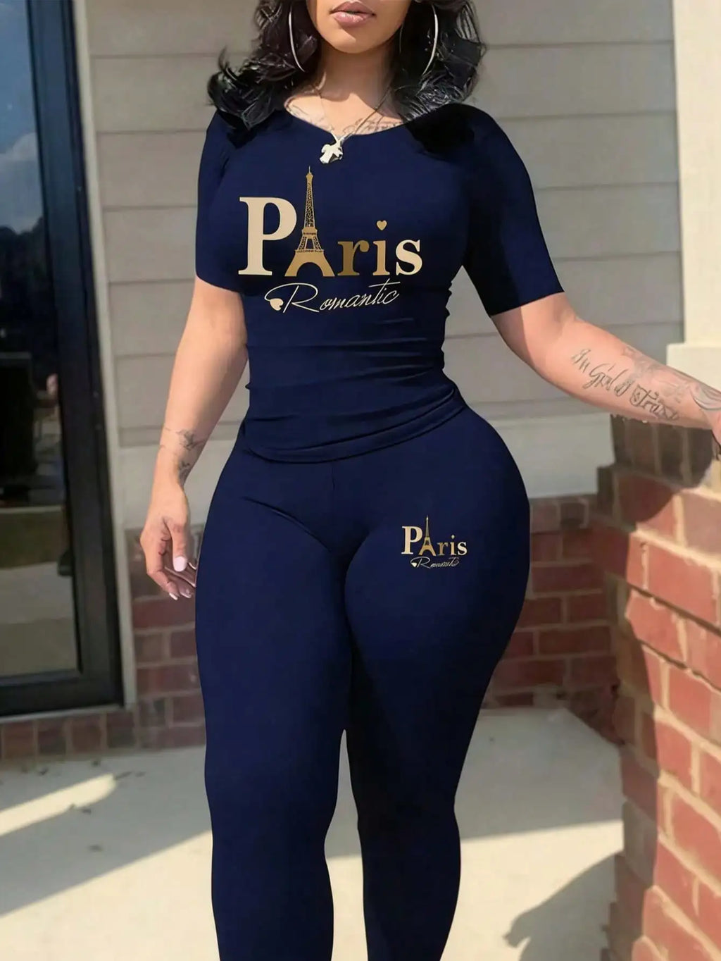 2026 women's new Paris printed two-piece set, casual short sleeved round neck T-shirt and tight pants long pants set